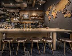 New Starbucks Store Joins Seattle S Iconic Coffee Scene Coffee House Interiors Coffee Shop Interior Design Starbucks Store