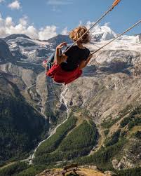 visit switzerland on instagram swing for fun just like elenakrizhevskaya in saas fee valais and just like in th travel abroad travel travel insurance