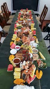 Our Boodle Fight Dinner For Dad S 82nd Bday Boodle Fight Kamayan Feast Italian Cuisine Recipe