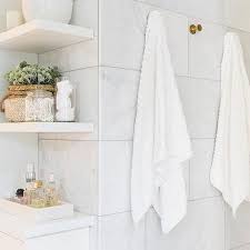 It could be made of wood; Marble And Brass Wall Shelves Design Ideas