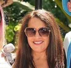 Should we book one room at Grand Floridian or two rooms at POP for our  family of six, including a baby, at Walt Disney World?