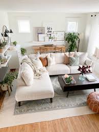 We think you'll see that a sectional couch could just be the one thing that your living room design has been missing! White Living Room White Sectional Decor Boho Design The Beauty Revival