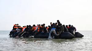 Record 128 migrants cross Channel in one boat as overall numbers drop -  Yahoo