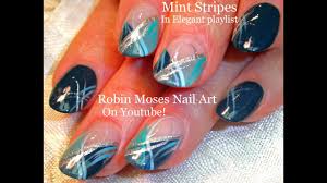 The beauty of these teal nail designs comes especially from this gorgeous color that combines green and blue in a bedazzling way. Cute Nails Diy Mint Stripe Nail Art Fun Silver And Teal Nail Design Youtube