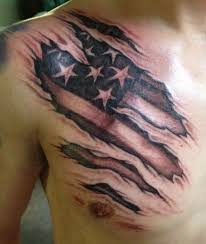 Black Ink American Flag Tattoo On Shoulder Black Ink Ripped Skin American Flag Tattoo On Man Right Front Shoulder Jpg 507 600 Ripped Skin Tattoo Flag Tattoo American Flag Tattoo