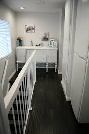 Dark Floors Grey Walls Grey Walls White Trim Grey And Yellow Grey Walls Wood Floors Wall Paint Val White Grey Paint Valspar Paint Colors Painted Staircases