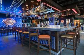 The menu at hard rock cafe reads like a greatest hits album of international favorites. Hard Rock Cafe Glyfada By Dimitris Economou Interiors Athens Cafe Bar Design Hard Rock Cafe Rooftop Bar Design
