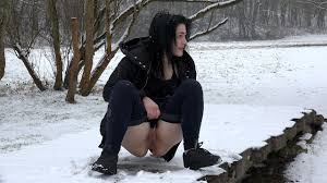 To urinate over yourself and the clothes you are wearing. Got2pee Dark Haired Girl Pees On A Bridge In The Snow