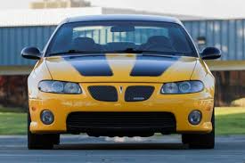 Image result for Yellow 2004 Pontiac