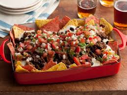Super Nachos Rachael Ray Tops Her Mexican Style Meal With Traditional Nacho Fixings Including Homemade Pico D Food Network Recipes Super Nachos Nachos Recipe