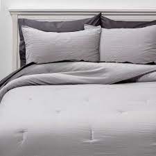 Texture and layering is an important element in creating a welcoming and inviting bedroom. Bed In A Bag Light Gray Solid Microfiber With Dark Gray Sheets Room Essentials In 2021 Grey Sheets Bedding Sets Comforter Bedding Sets