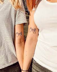 What tattoo should i get with my best friend. 85 Hearty Matching Best Friend Tattoos And Meanings