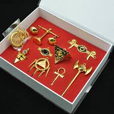 Yu Gi Oh Millennium Items Puzzle Eye Ring Necklace Keychain Pendant 8pcs Set Box Ebay These are all made from metal. usd