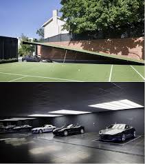 A Mansion In Melbourne S Toorak The Batcave Dream House Exterior Garage Design Luxury Garage