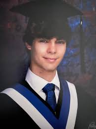 I can't believe Spencer's grad photos are in!! I am having a moment 😭😭