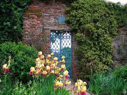 Blue Gate And Irises At Sissinghurst Beautiful Gardens Castle Garden Garden Inspiration