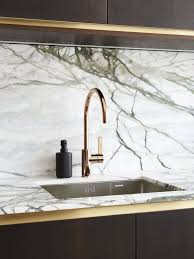 White and grey kitchens backsplash showrooms furniture mart. Showroom Kitchen Kitchen Marble Oak Kitchen Marble Kitchen Island