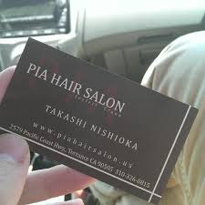 Professional stylist olha cuts hair into modern styles; Pia Hair Salon Salon Barbershop In Torrance
