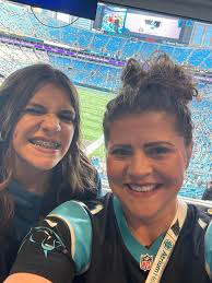 Nothing like casually meeting your daughter, her boyfriend and his family  at the Panthers game 🩵🖤 Thanks Kelly Gilbert Fleming!!!