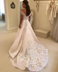 This Lace And Embroidery Bridal Gown Can Be Recreated With Any Design Preferences We Make Replicas Of Disney Wedding Dresses Wedding Dresses Bridal Dresses