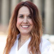 Ashley E. McCall, MPT, Ph.D.