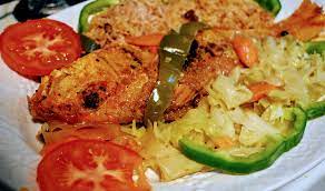 In a deep pot, saute the onion, thyme, green onion, bell pepper and garlic with a little oil. Jamaica Brown Stew Fish