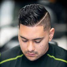 Since asymmetrical haircuts tend to be more trending hairstyles, we recommend you visit a good men's hairstylist (not a traditional barber). Best Hairstyles For Round Faces For Men