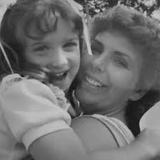 Tomorrow, Mom. Tomorrow is book day. When my book hits the shelves— this is  how I'll picture you. Happy and full of love. I'll imagine you like this—  hugging me and joyful.