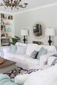 White Slipcovered Sofas With Aqua And Navy Accents In Summer Living Room Summer Home Family Friendly Living Room Summer Living Room Summer Living Room Decor