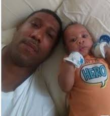 Father and his 2-year-old son killed in a Bedford apartment fire