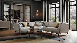 We added a dining area to the corner of our living room to create an open living layout that's right off the kitchen. How To Decorate L Shaped Living Rooms Dogtas