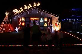 Gold lighted reindeer & sleigh set. Santa Claus And His Reindeer Take Off From A Roof In Sydney Australia Decorating With Christmas Lights Reindeer Lights Christmas Home