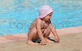 A board for totally cute toddler clothing. Cute Toddler Girl Playing In A Swimming Stock Image Colourbox