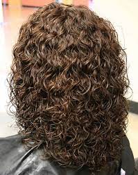 Simply get your hair normally permed and tie a loose bun. Pin On Curly