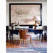 A Really Large Piece Of Art Behind A Desk Can Make Your Workspace Look Rather Regal Home Office Design Home Home Decor