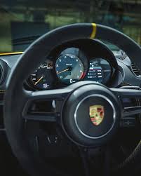 The 718 Cayman Gt4 S Sporty And Uncompromising Exterior Look Is Maintained Throughout Its Interior Design The Black Interio In 2020 Cayman Gt4 Porsche Classic Porsche