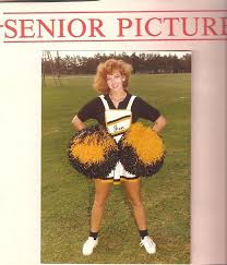 Black And Gold Cheerleading Pom Poms So Old School Look How Big The Poms Are Cheerleader Cheer Cheerleading Cheerleading School Cheerleading Varsity Sweater