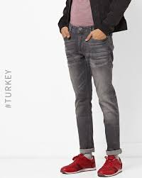 mid wash slim fit jeans with whiskers