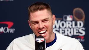 Freddie Freeman celebrates walk-off grand slam with father, family