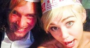 Miley Cyrus is now living with her homeless friend Jesse Held