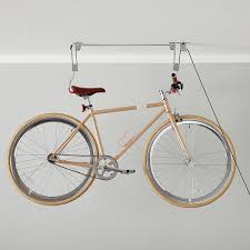 This bicycle storage solution offers a unique experience of an easy and simple space saving. Ceiling Mount Bike Lift The Container Store