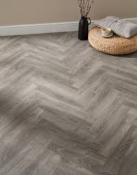 Cork bark is another choice, providing thermal and acoustic properties. Vintage Chateau Herringbone Light Grey Laminate Flooring Direct Wood Flooring
