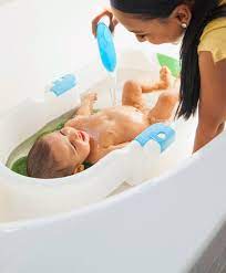 I put a towel down into the tub and have another close by for driving. Baby S First Bath How To Bathe A Newborn