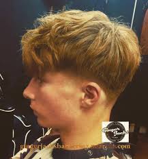 Low taper fade left with longer length