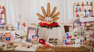 Texas gourmet pasta, bread mix, texas olive oil, carmine's dip mix, cowgirl coffee, jalapeno gold jam and a burlap bag full of sugar pecans. Couple Throws An Epic State Fair Themed Wedding Complete With Ferris Wheel Corn Dogs Abc News