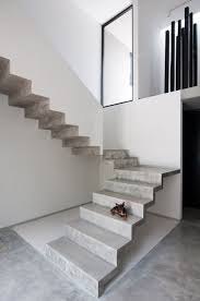 Dezeen Selects 10 Of The Best Staircases Of 2014 From Concrete Curves And Twisting Corkscrews To Structur Concrete Staircase Interior Stairs Staircase Design