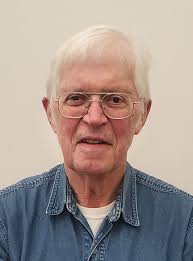 Yates looks at weapons ban in county buildings