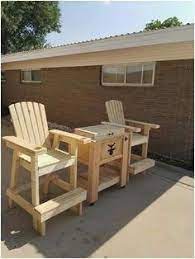 Rustic Yet Comfy Adirondack Chairs Are Pieces Of Patio Furniture In Canada That Never Ever Go Out Of Style Rustic Furniture Outdoor Furniture Plans Furniture