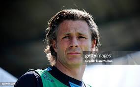 Jordan Chappell of Torquay United battles for the ball with Aaron... News  Photo