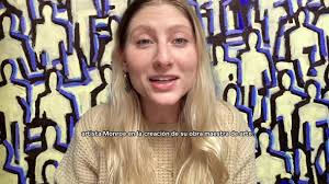 Volunteer Kona Caguao talking about his experience during art workshop with  artist Fabio Mesa.